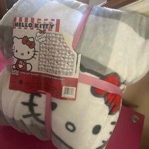 Light grey checkered hello kitty plush blanket